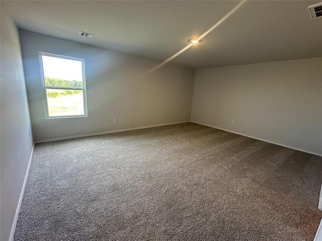 43067 Wagon Trl, Shawnee, OK 74804 - empty room with dark carpet and baseboards