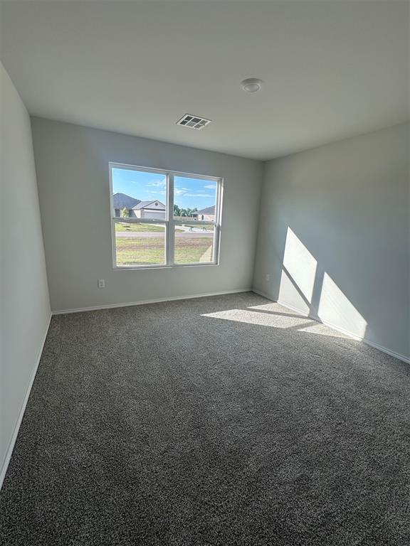 43067 Wagon Trl, Shawnee, OK 74804 - spare room with carpet and baseboards