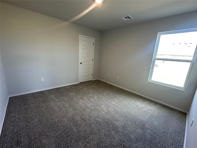 43067 Wagon Trl, Shawnee, OK 74804 - carpeted spare room featuring baseboards