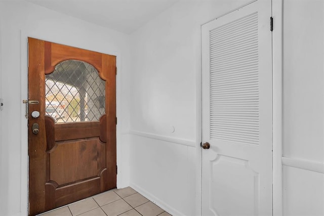 foyer with light tile patterned floors