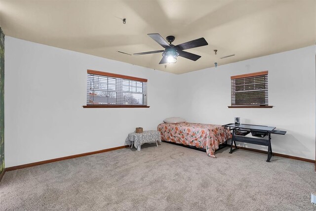 bedroom featuring carpet flooring, ceiling fan, and baseboards