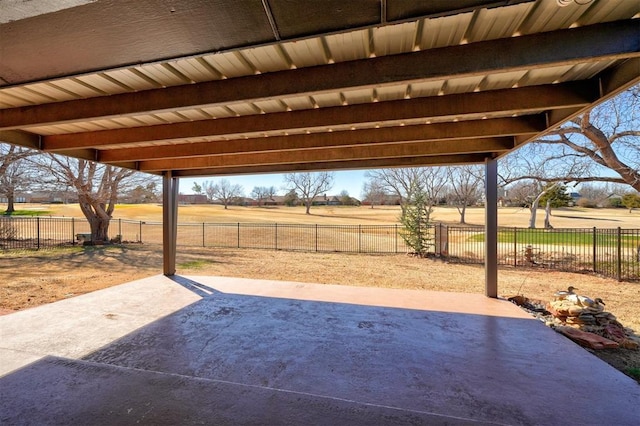 view of patio featuring a fenced backyard and a rural view