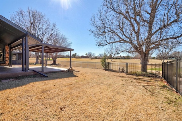 view of yard with a patio area and fence