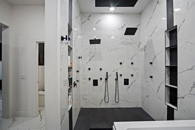 full bathroom featuring marble finish floor and a marble finish shower