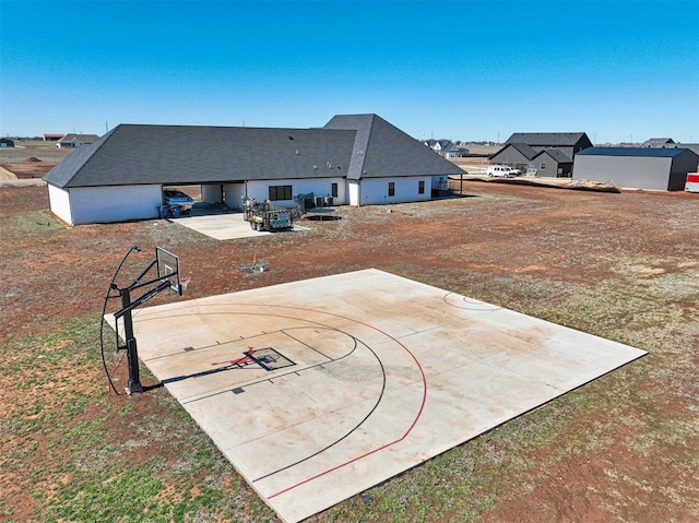 exterior space with community basketball court