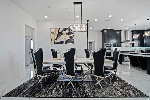 dining area with a notable chandelier, marble finish floor, baseboards, and recessed lighting