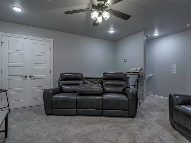 cinema room with carpet floors, recessed lighting, baseboards, and a ceiling fan