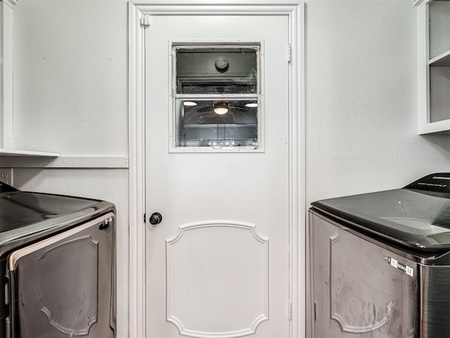 laundry area featuring washer and dryer and laundry area