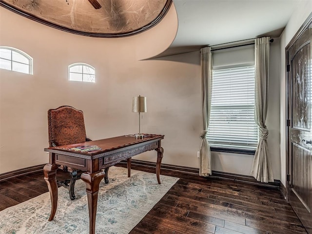 office space with hardwood / wood-style flooring and baseboards