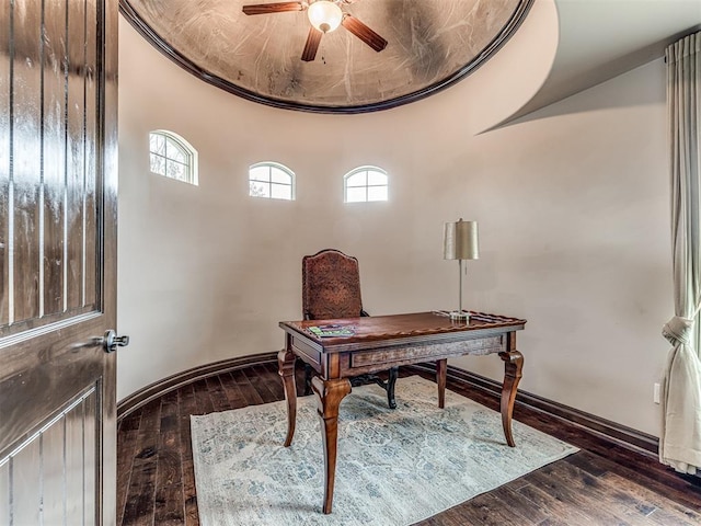 office area with ceiling fan, hardwood / wood-style floors, and baseboards