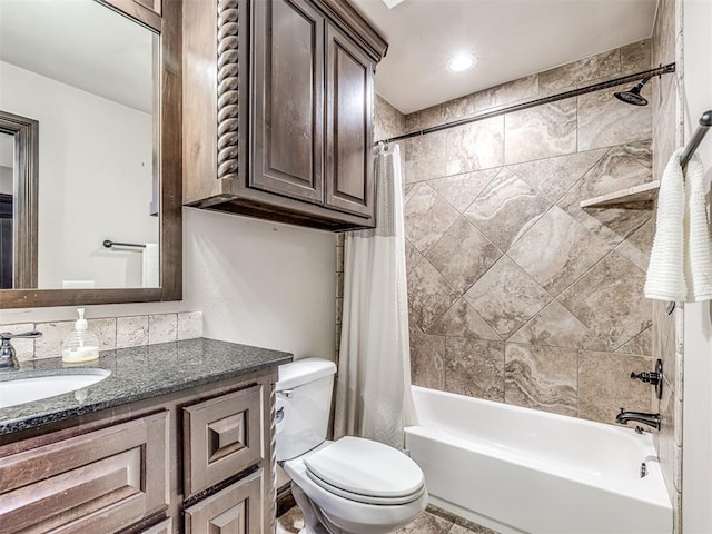 bathroom featuring shower / tub combo with curtain, vanity, and toilet