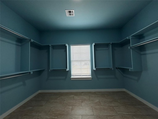 spacious closet with visible vents