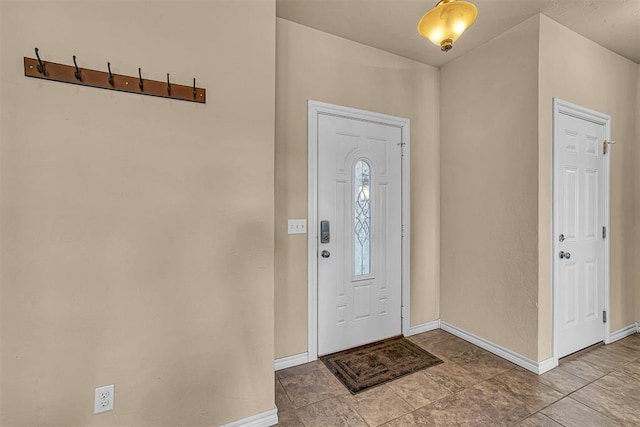 entrance foyer featuring baseboards