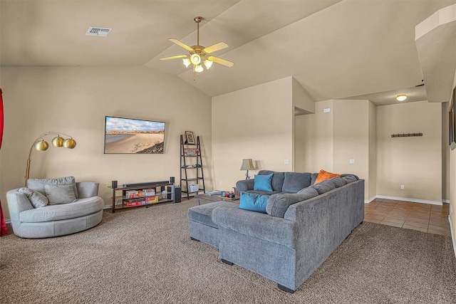 carpeted living area featuring baseboards, visible vents, ceiling fan, tile patterned flooring, and vaulted ceiling