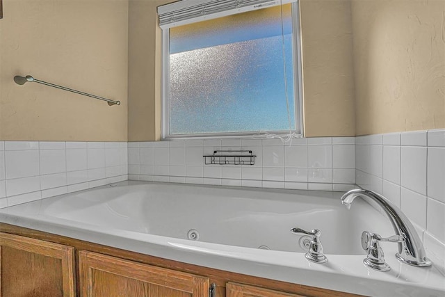 bathroom featuring a whirlpool tub