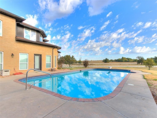 outdoor pool with a patio