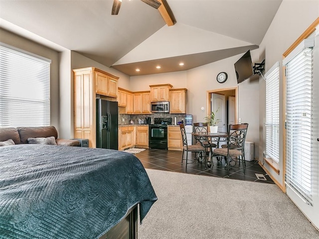 bedroom with beam ceiling, dark colored carpet, black fridge with ice dispenser, high vaulted ceiling, and dark tile patterned floors