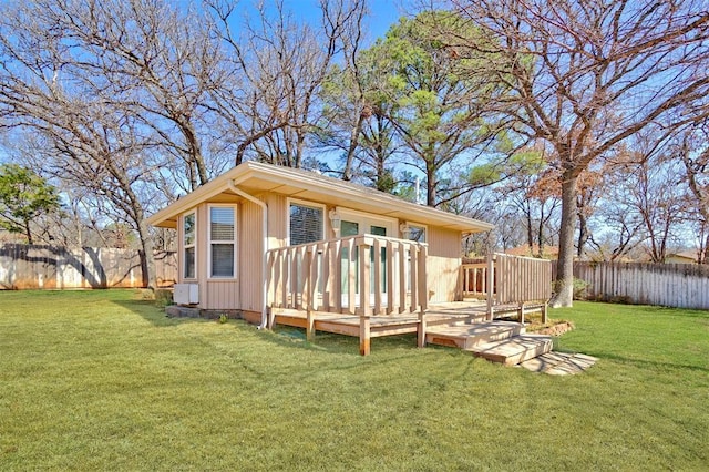 view of outdoor structure featuring a fenced backyard