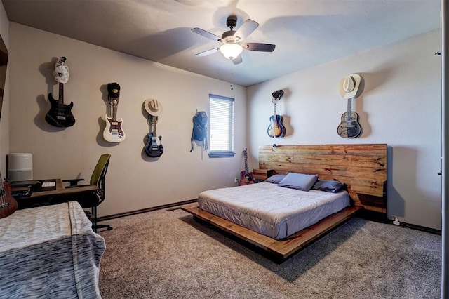 bedroom with a ceiling fan, carpet, and baseboards