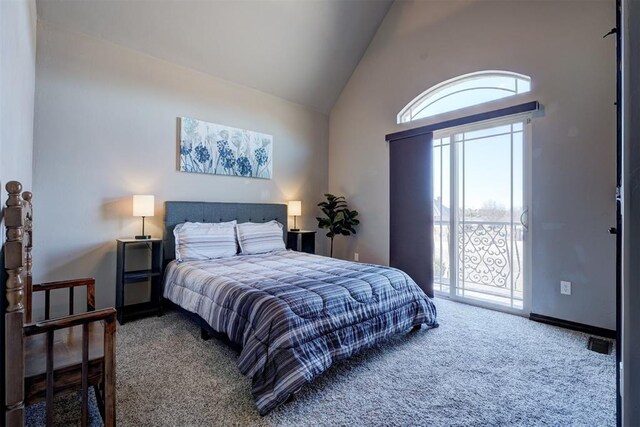 carpeted bedroom featuring lofted ceiling, access to outside, visible vents, and baseboards