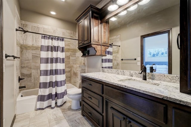 full bathroom featuring shower / tub combo, marble finish floor, vanity, and toilet