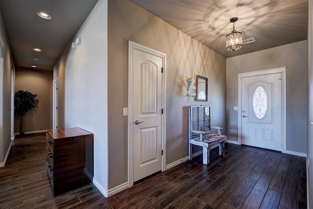 entryway featuring recessed lighting, visible vents, dark wood finished floors, and baseboards