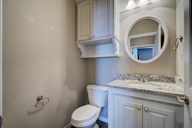 half bath with toilet and vanity