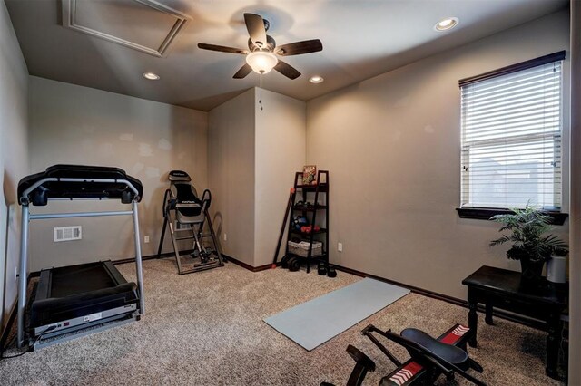 exercise area featuring recessed lighting, visible vents, carpet flooring, ceiling fan, and baseboards