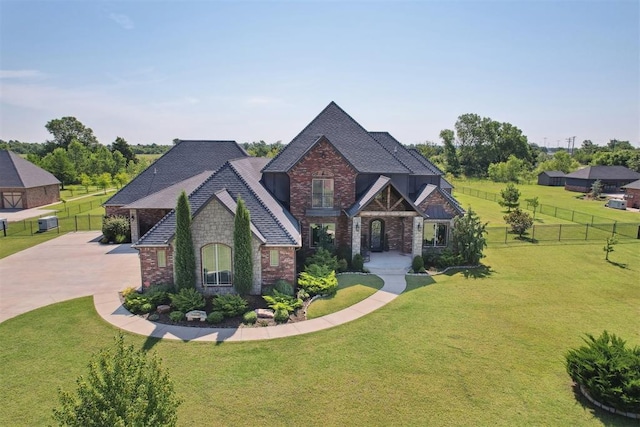 5900 Twin Fawn Trl, Mustang, OK 73064 - view of front of home with brick siding, concrete driveway, and roof with shingles
