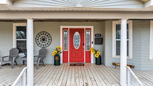 doorway to property with a porch