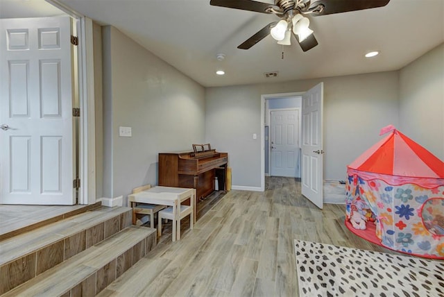 game room featuring recessed lighting, wood finished floors, a ceiling fan, visible vents, and baseboards