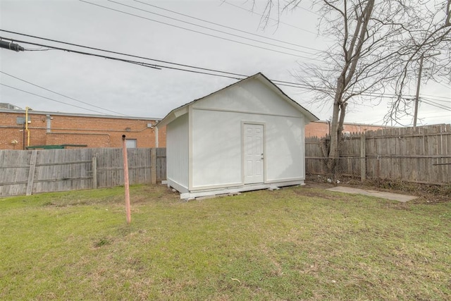 view of shed featuring a fenced backyard