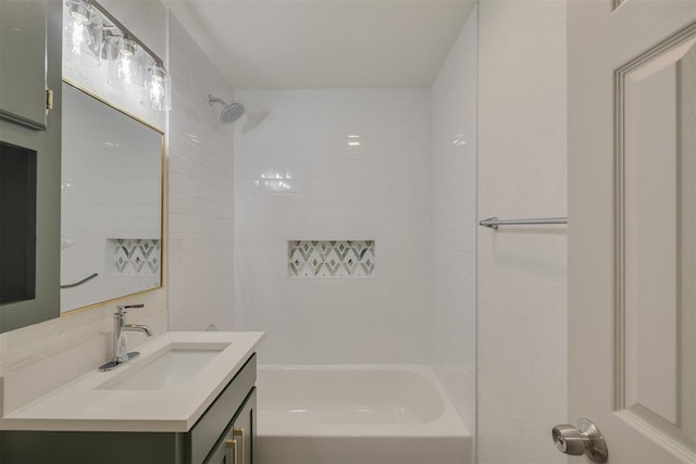 bathroom with washtub / shower combination and vanity