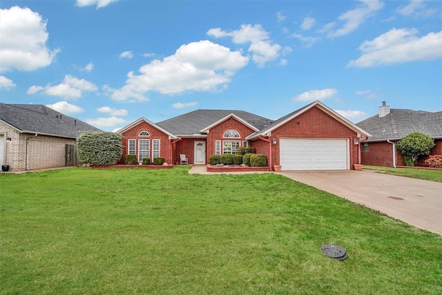 view of front of home with brick siding, an attached garage, concrete driveway, and a front yard