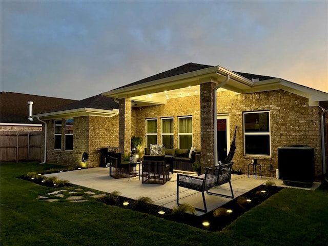 back of property featuring outdoor lounge area, central AC unit, a patio area, and fence