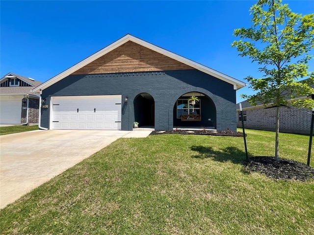 16340 Cold Fire Rd, Oklahoma City, OK 73170 - single story home featuring concrete driveway, a front yard, brick siding, and a garage