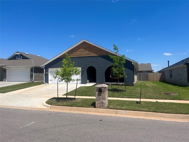 16340 Cold Fire Rd, Oklahoma City, OK 73170 - ranch-style house with concrete driveway, a garage, and brick siding