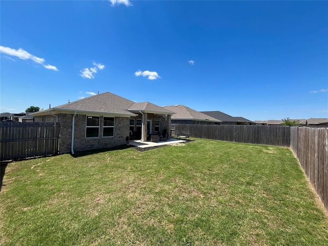 16340 Cold Fire Rd, Oklahoma City, OK 73170 - back of property featuring a patio and brick siding