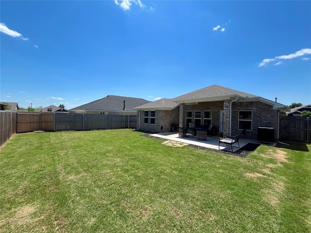16340 Cold Fire Rd, Oklahoma City, OK 73170 - rear view of property with a patio, brick siding, and central AC unit
