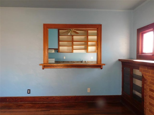 spare room with crown molding