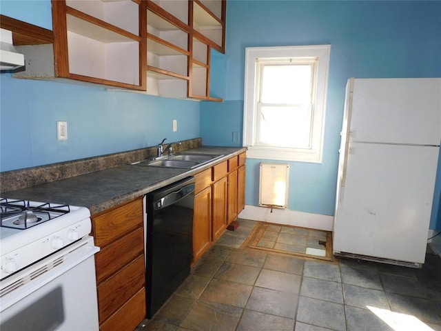 kitchen featuring white appliances, a sink, open shelves, brown cabinetry, and dark countertops