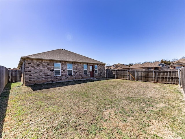 exterior space with a fenced backyard