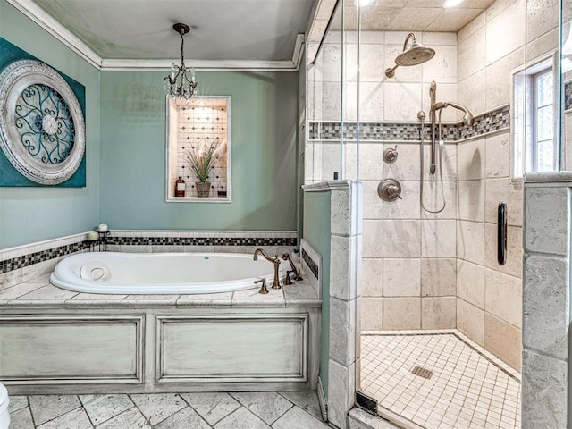 full bathroom with a stall shower, a garden tub, and crown molding