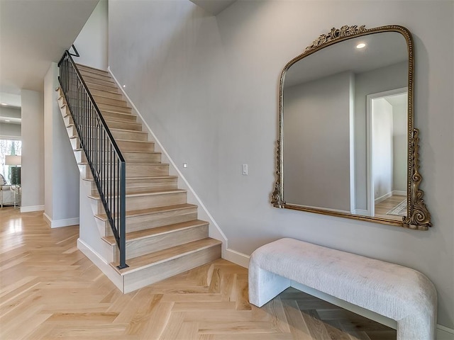 stairs featuring recessed lighting and baseboards