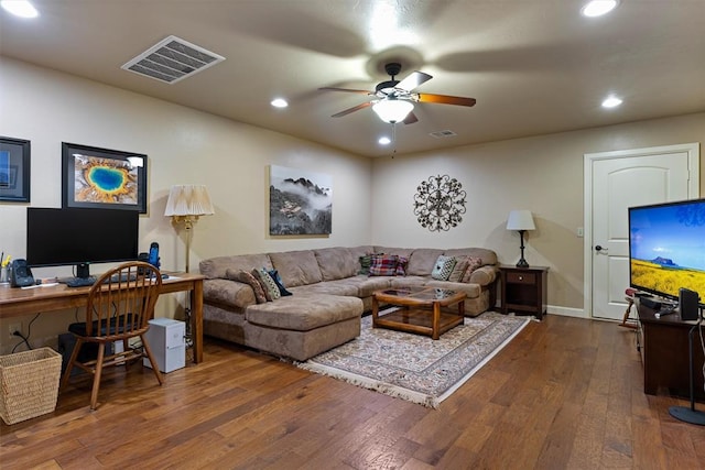 living room with hardwood / wood-style flooring, ceiling fan, visible vents, and recessed lighting