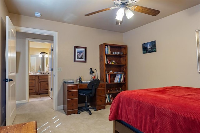 bedroom with light carpet and baseboards