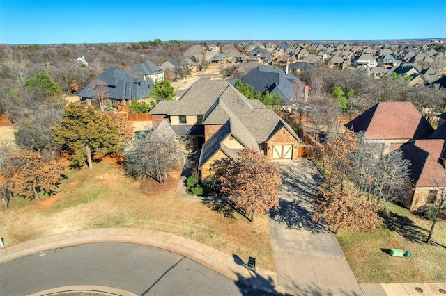 birds eye view of property with a residential view