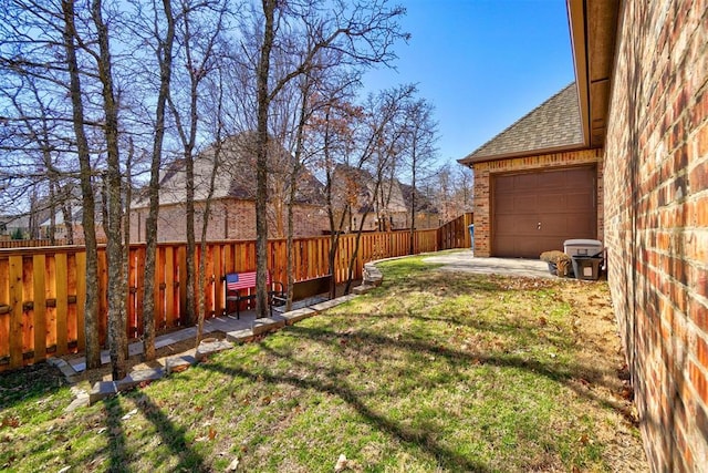 view of yard with fence private yard and driveway