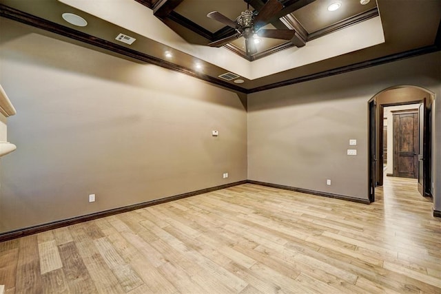 unfurnished room with arched walkways, ornamental molding, ceiling fan, light wood-type flooring, and coffered ceiling