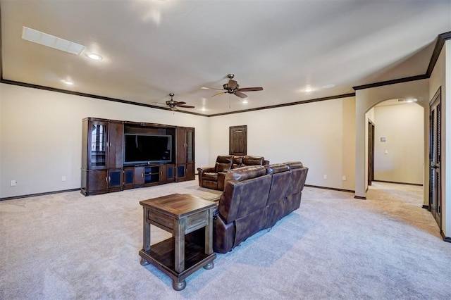 cinema with recessed lighting, light carpet, visible vents, baseboards, and ornamental molding